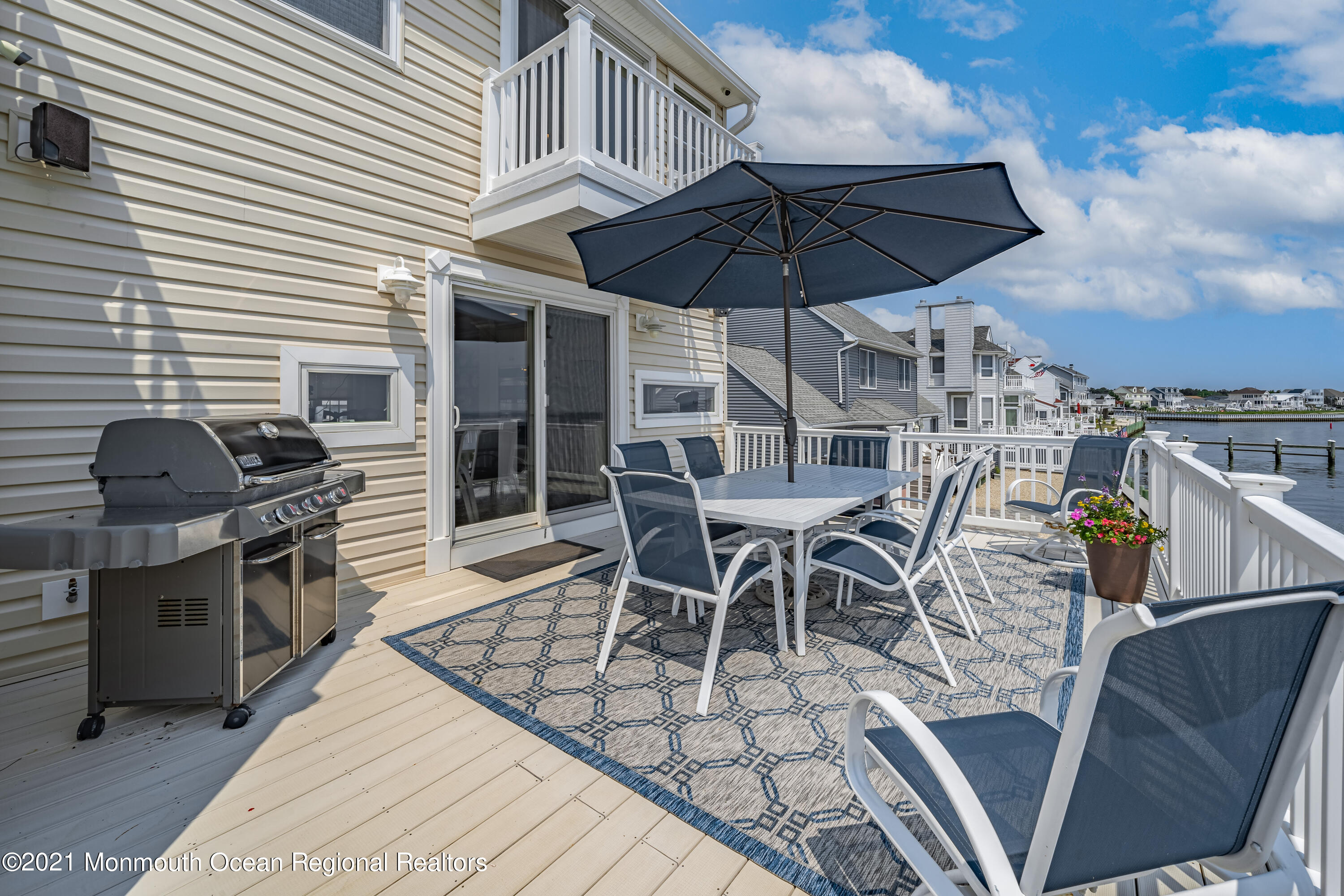 117 Clifton Road Barnegat, NJ 08005 - Photo 40 of 44 a view of a dinning tables and chairs in the patio