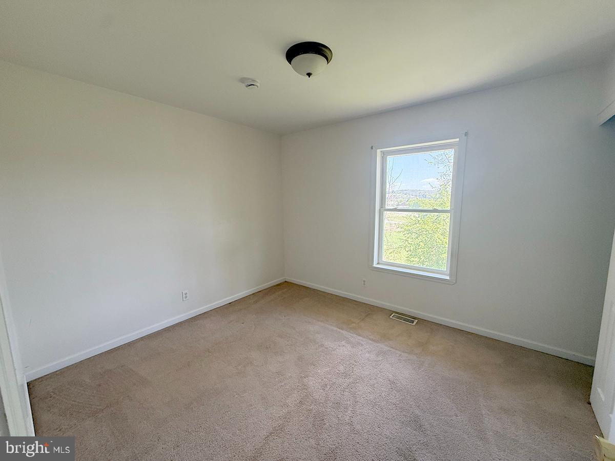 1121 Montour Road Loysville, PA 17047 - Photo 14 of 20 an empty room with a window