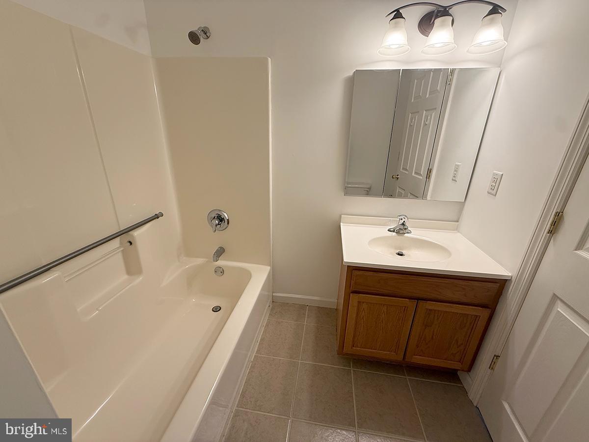 1121 Montour Road Loysville, PA 17047 - Photo 8 of 20 a spacious bathroom with a bathtub sink and mirror