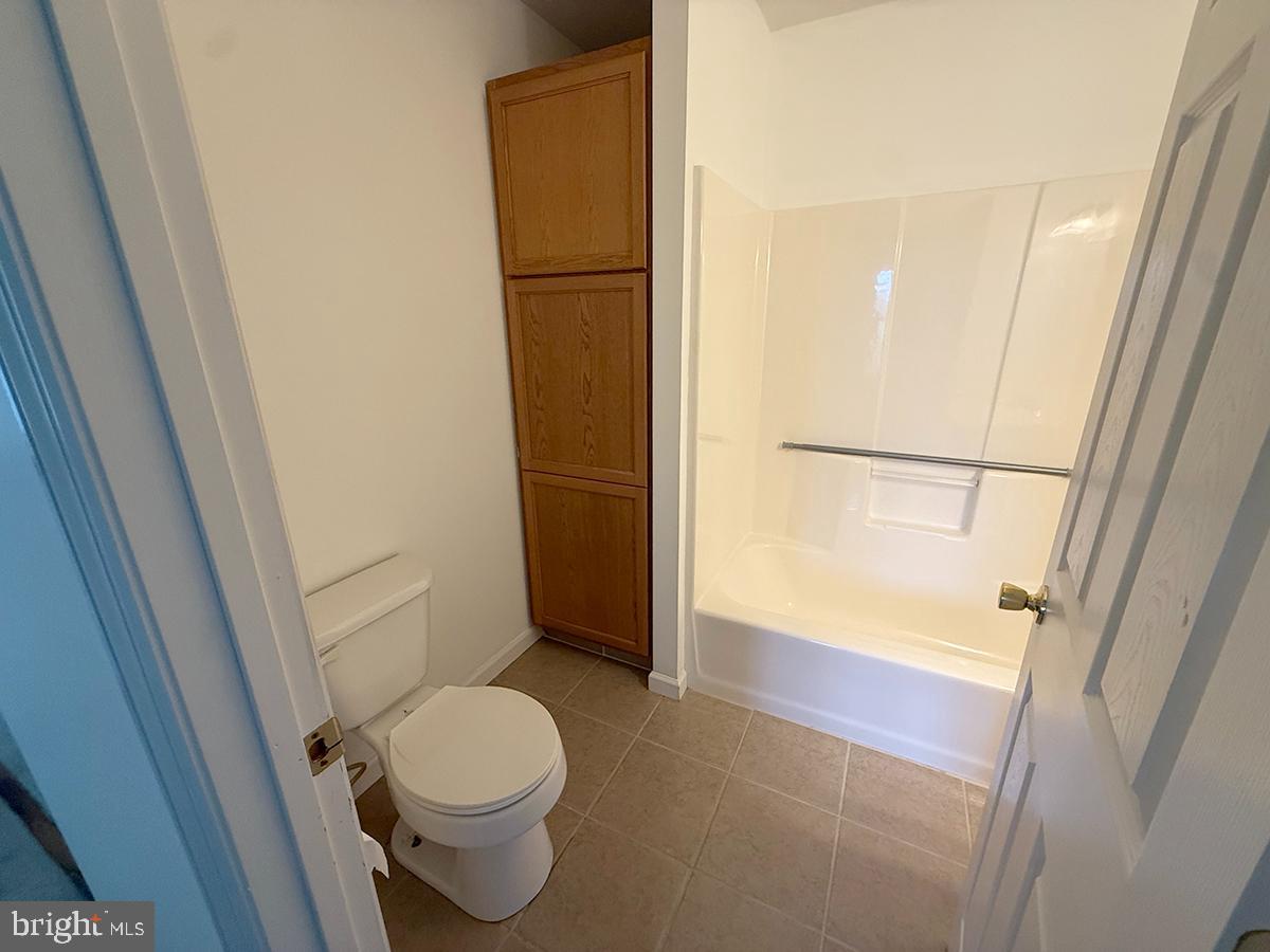 1121 Montour Road Loysville, PA 17047 - Photo 9 of 20 a bathroom with a toilet and a shower