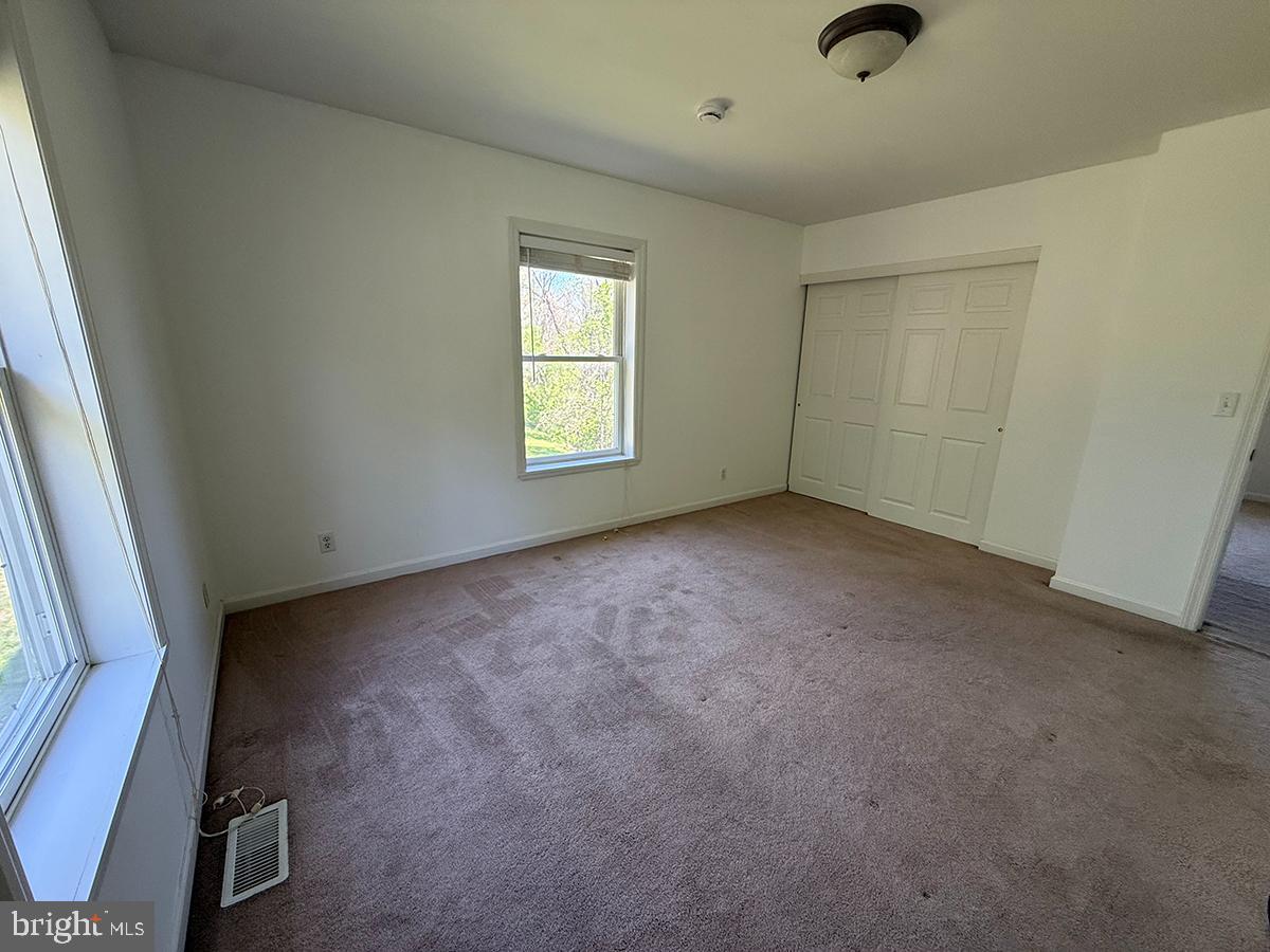 1121 Montour Road Loysville, PA 17047 - Photo 10 of 20 an empty room with windows