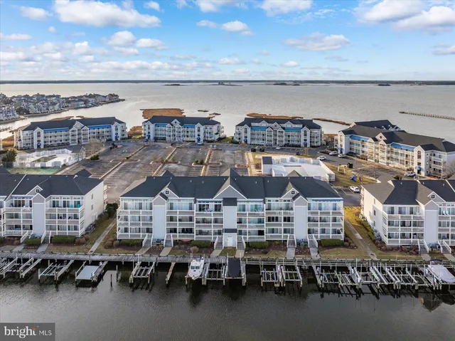 a view of a hallway with dining area