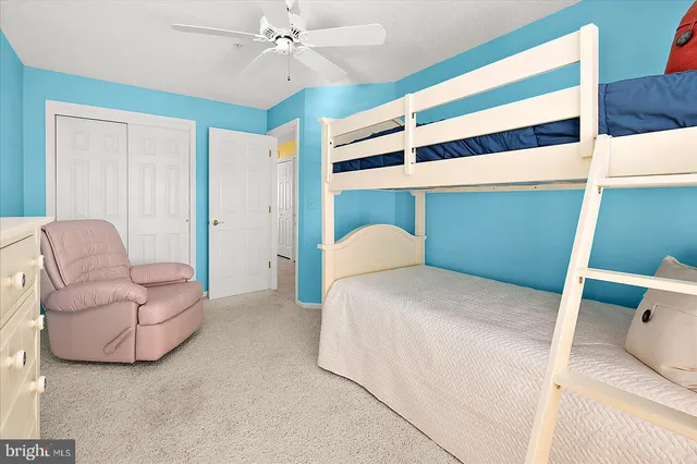 a view of a lake with boats and trees