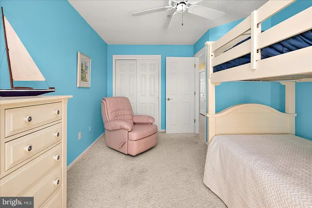 a view of a lake with tall buildings