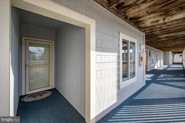a view of balcony with furniture