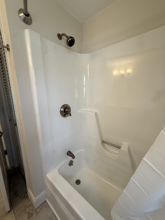 1 Joyce Road Peabody, MA 01960 - Photo 7 of 12 a bathroom with a bathtub