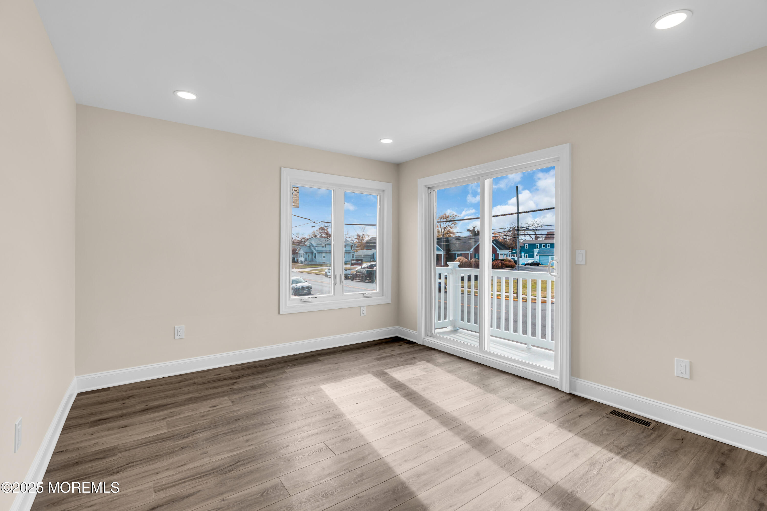 1900 Main Street Belmar, NJ 07719 - Photo 16 of 20 a view of a room with wooden floor and windows