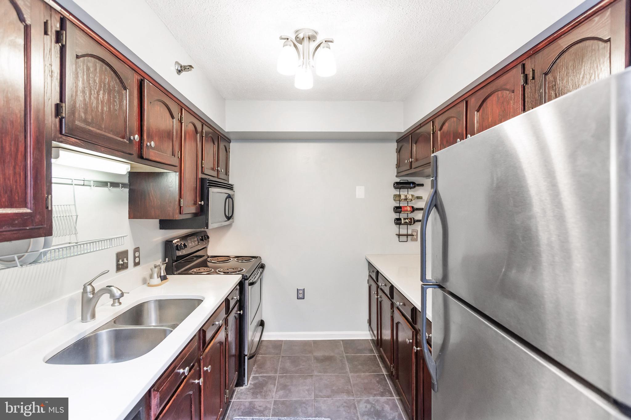 1301 North Courthouse Road, Unit 1414 Arlington, VA 22201 - Photo 2 of 41 Kitchen with Quartz and lots of storage