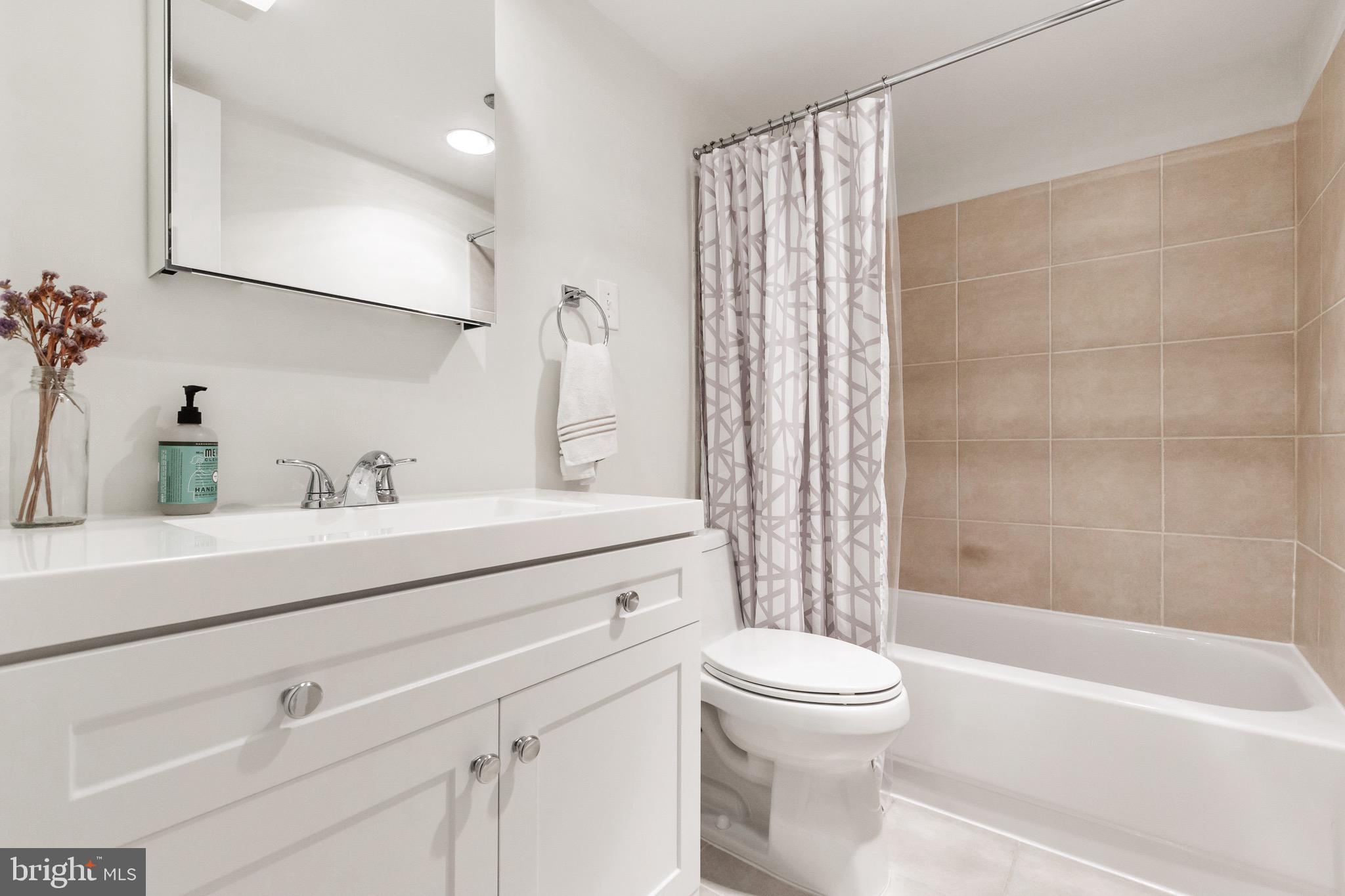 1301 North Courthouse Road, Unit 1414 Arlington, VA 22201 - Photo 4 of 41 Renovated Bathroom
