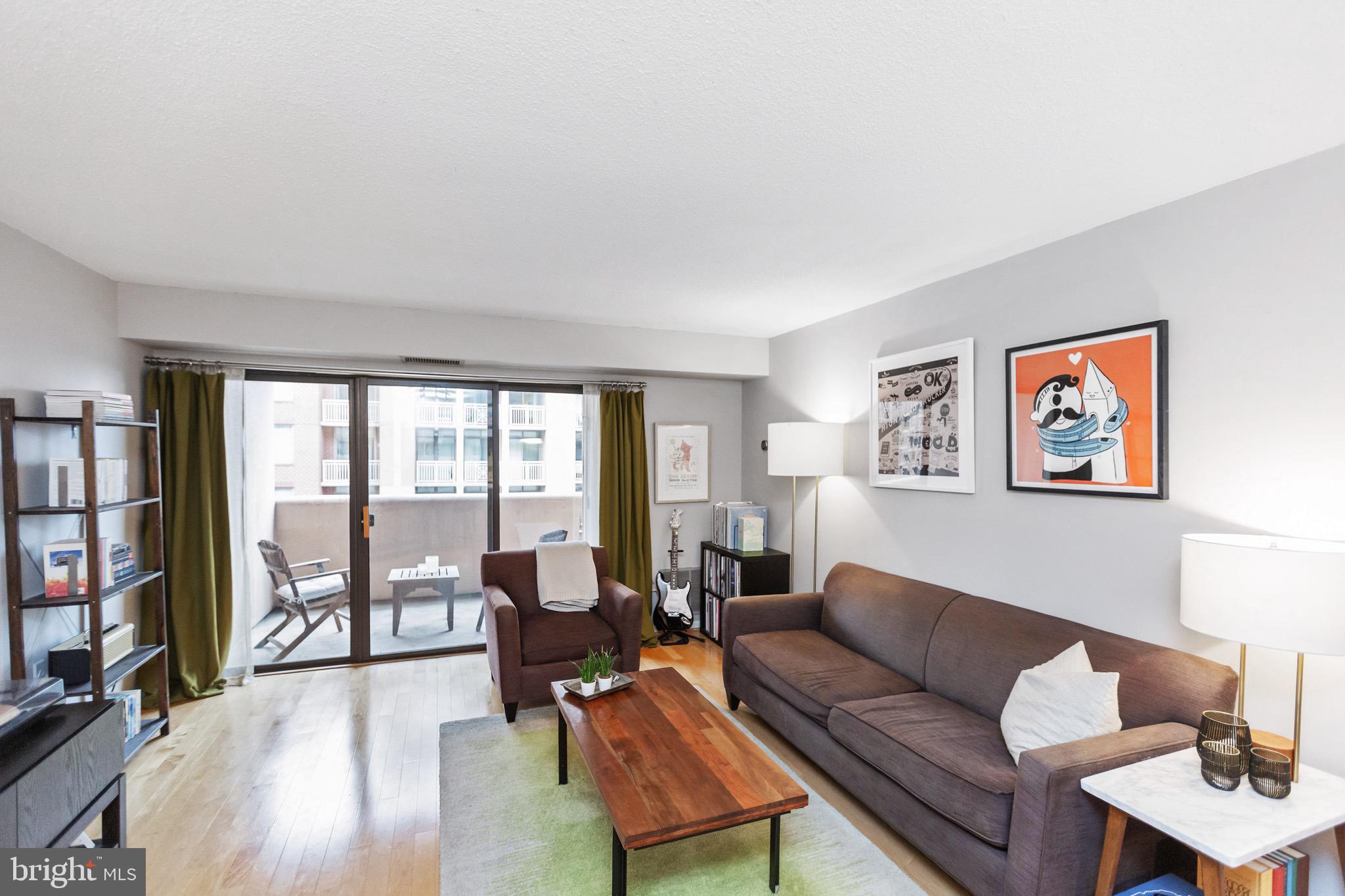 1301 North Courthouse Road, Unit 1414 Arlington, VA 22201 - Photo 7 of 41 Living open to covered balcony