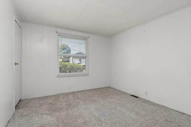 an empty room with window