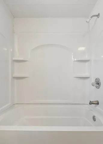 a bathroom with a bathtub