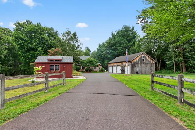 a view of house and outdoor space and street view