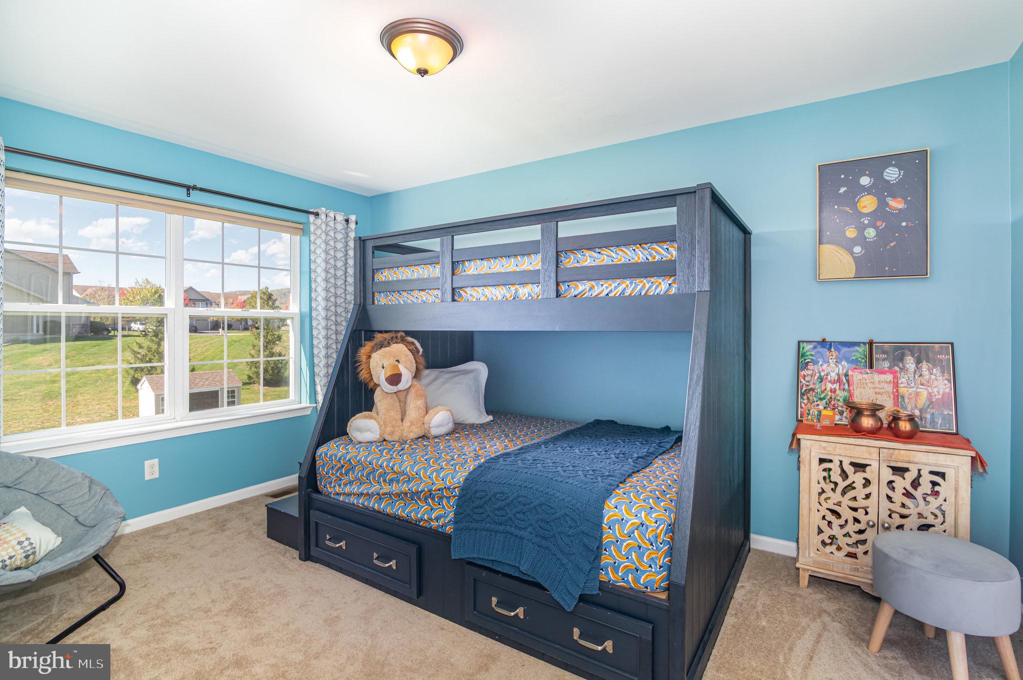 2786 Silver Maple Drive Harrisburg, PA 17112 - Photo 14 of 25 a bedroom with a bed and wooden floor