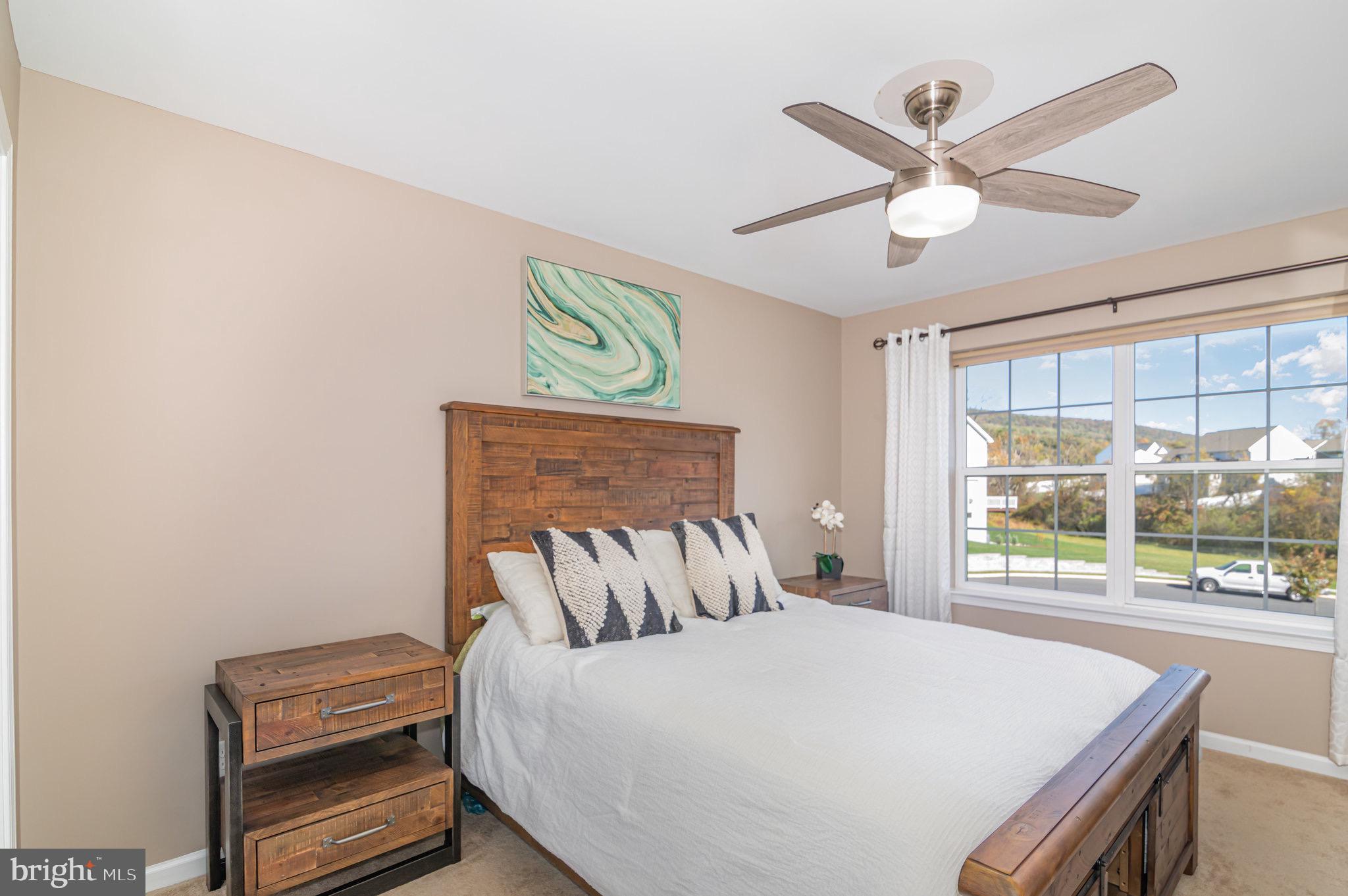 2786 Silver Maple Drive Harrisburg, PA 17112 - Photo 15 of 25 a bedroom with a bed and a window