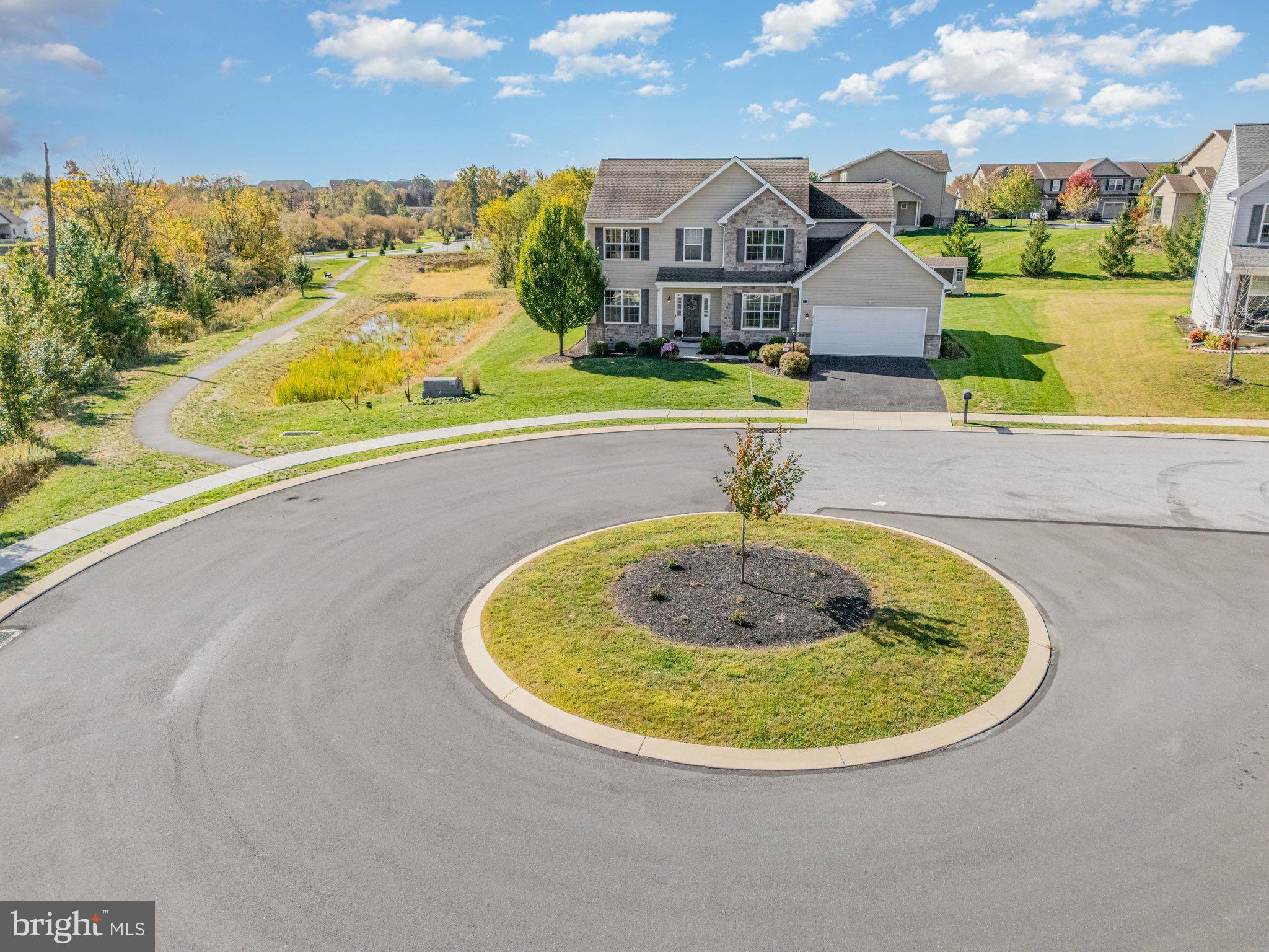 2786 Silver Maple Drive Harrisburg, PA 17112 - Photo 21 of 25 a view of a swimming pool with a lawn chairs