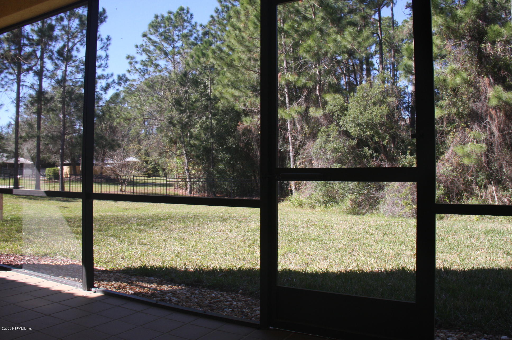 9745 Touchton Road, Unit 2401 Jacksonville, FL 32246 - Photo 35 of 50 a view of an outdoor space and swimming pool from a balcony
