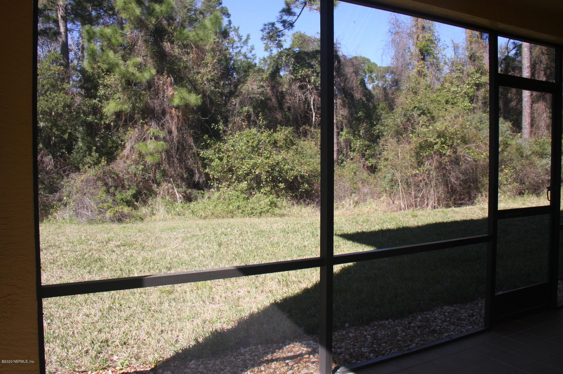 9745 Touchton Road, Unit 2401 Jacksonville, FL 32246 - Photo 36 of 50 a view of a glass door and a window