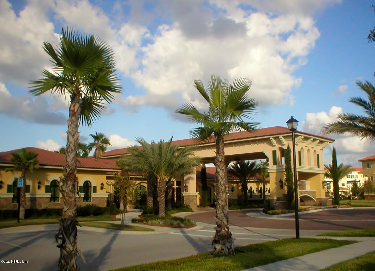 9745 Touchton Road, Unit 2401 Jacksonville, FL 32246 - Photo 4 of 50 a view of a street with palm trees