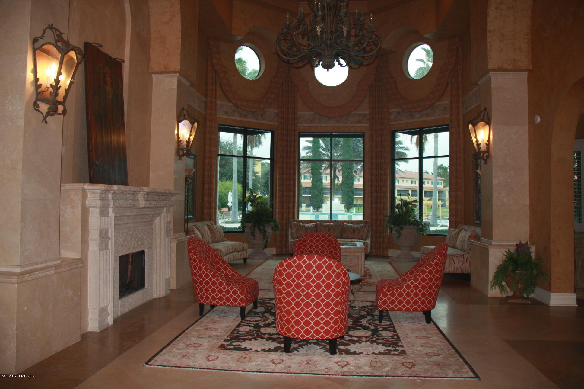 9745 Touchton Road, Unit 2401 Jacksonville, FL 32246 - Photo 44 of 50 a living room with furniture and a fireplace