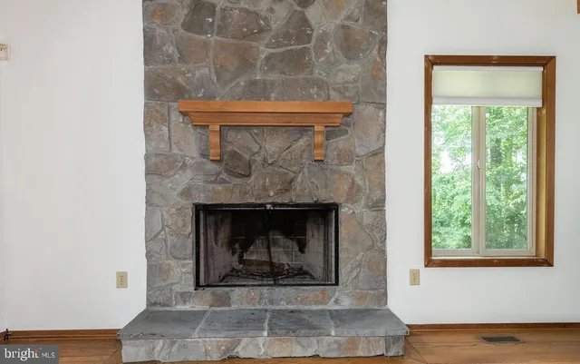 a living room with a fireplace