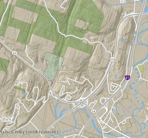 a view of a dry yard with wooden floor