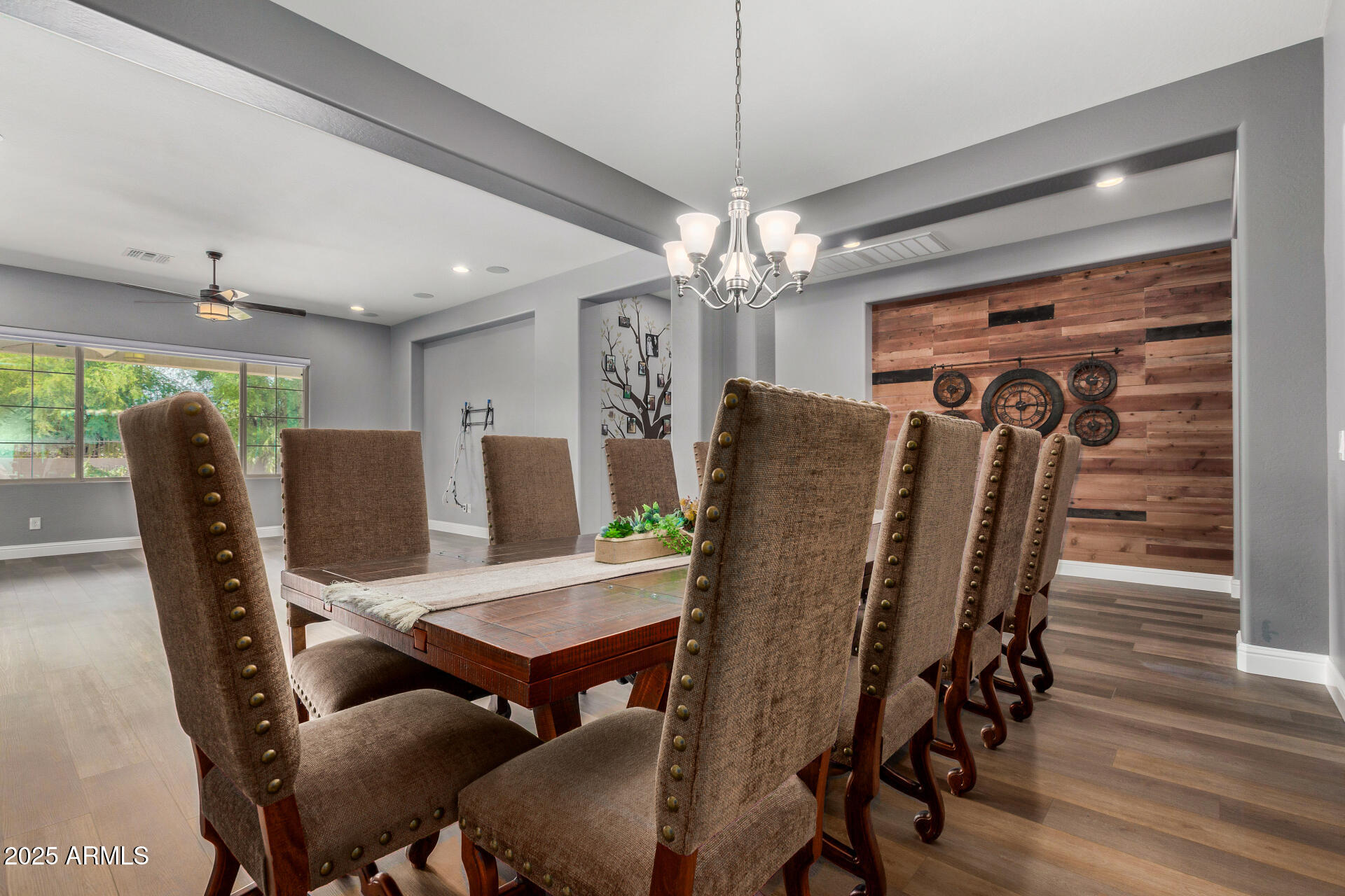1672 South Sunset Drive Chandler, AZ 85286 - Photo 15 of 68 a view of a dining room with furniture and chandelier