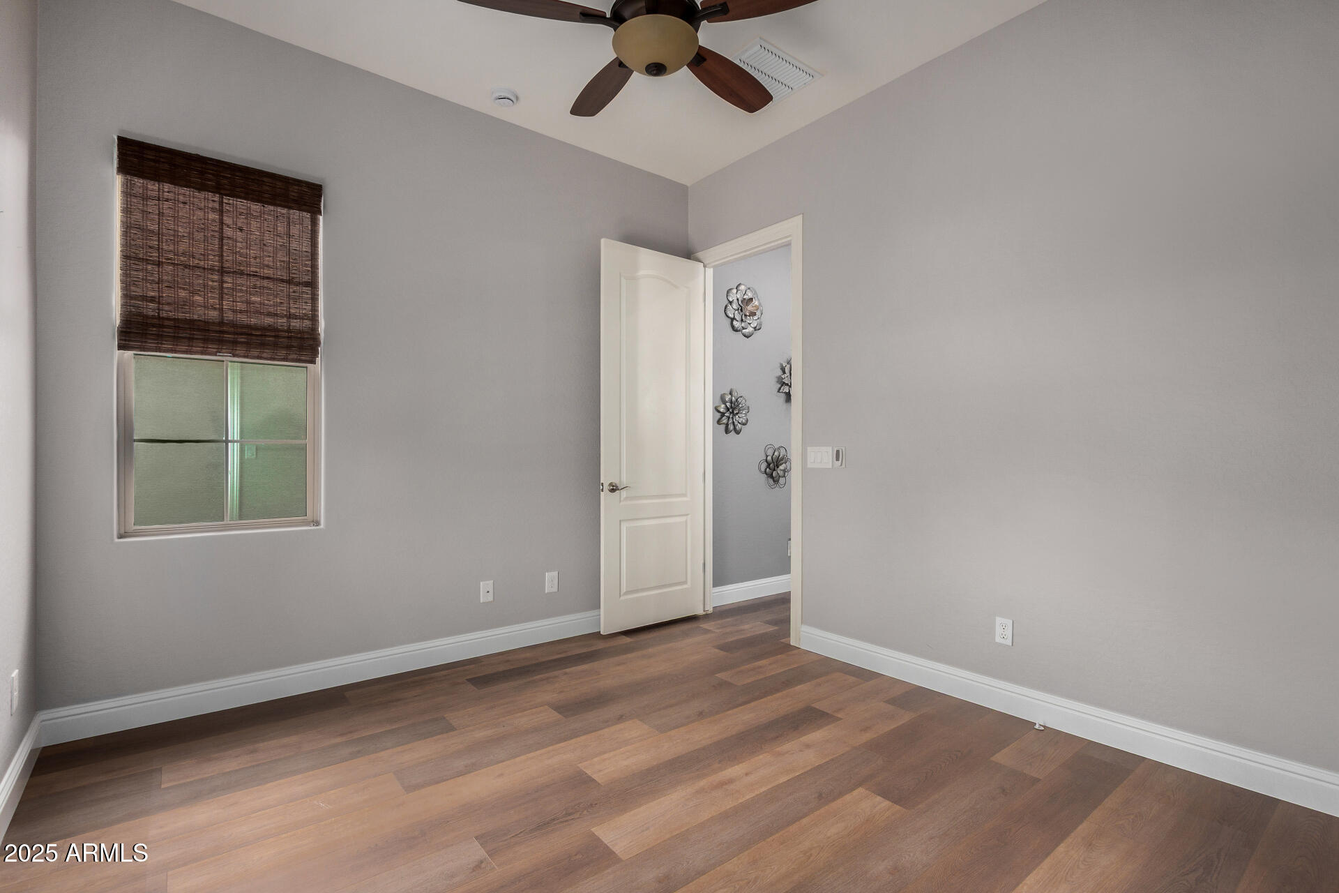 1672 South Sunset Drive Chandler, AZ 85286 - Photo 30 of 68 a view of an empty room with a window