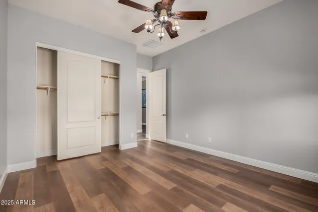 a view of a golf course with a lake