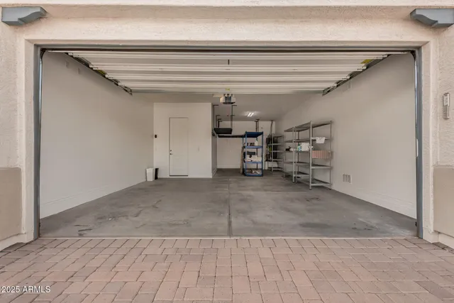 a view of a house with a street