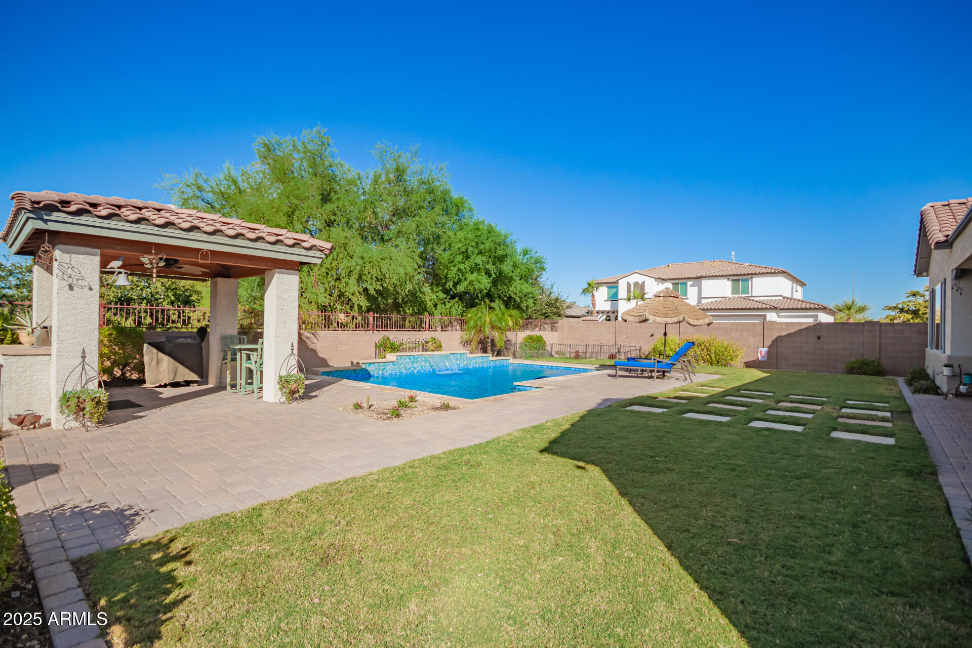 1672 South Sunset Drive Chandler, AZ 85286 - Photo 42 of 68 a view of a house with backyard and sitting area