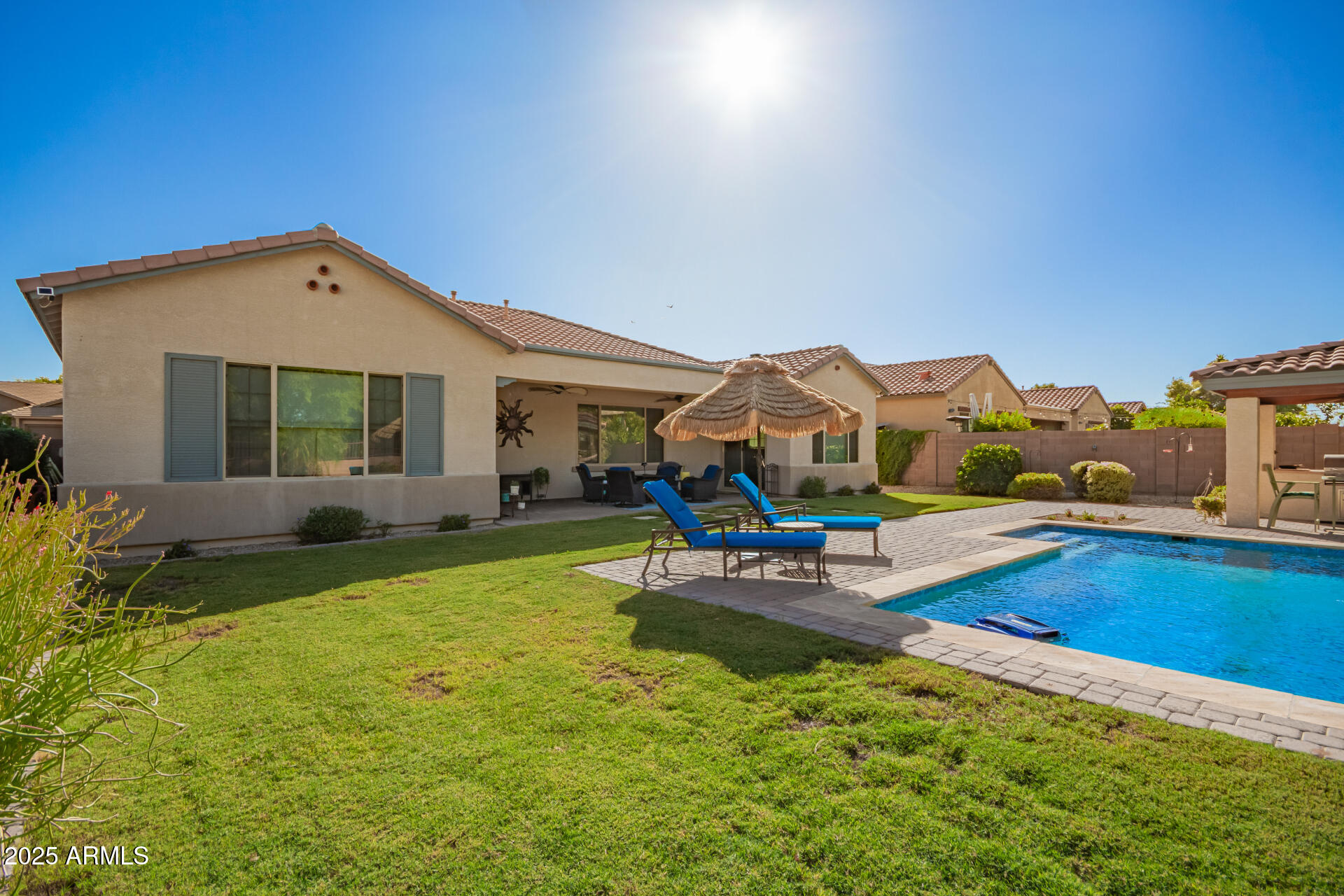 1672 South Sunset Drive Chandler, AZ 85286 - Photo 46 of 68 a view of a house with pool porch and wooden floor