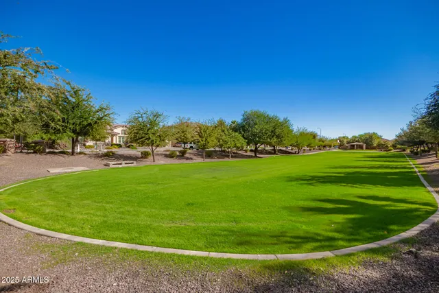 an aerial view of residential houses and outdoor space