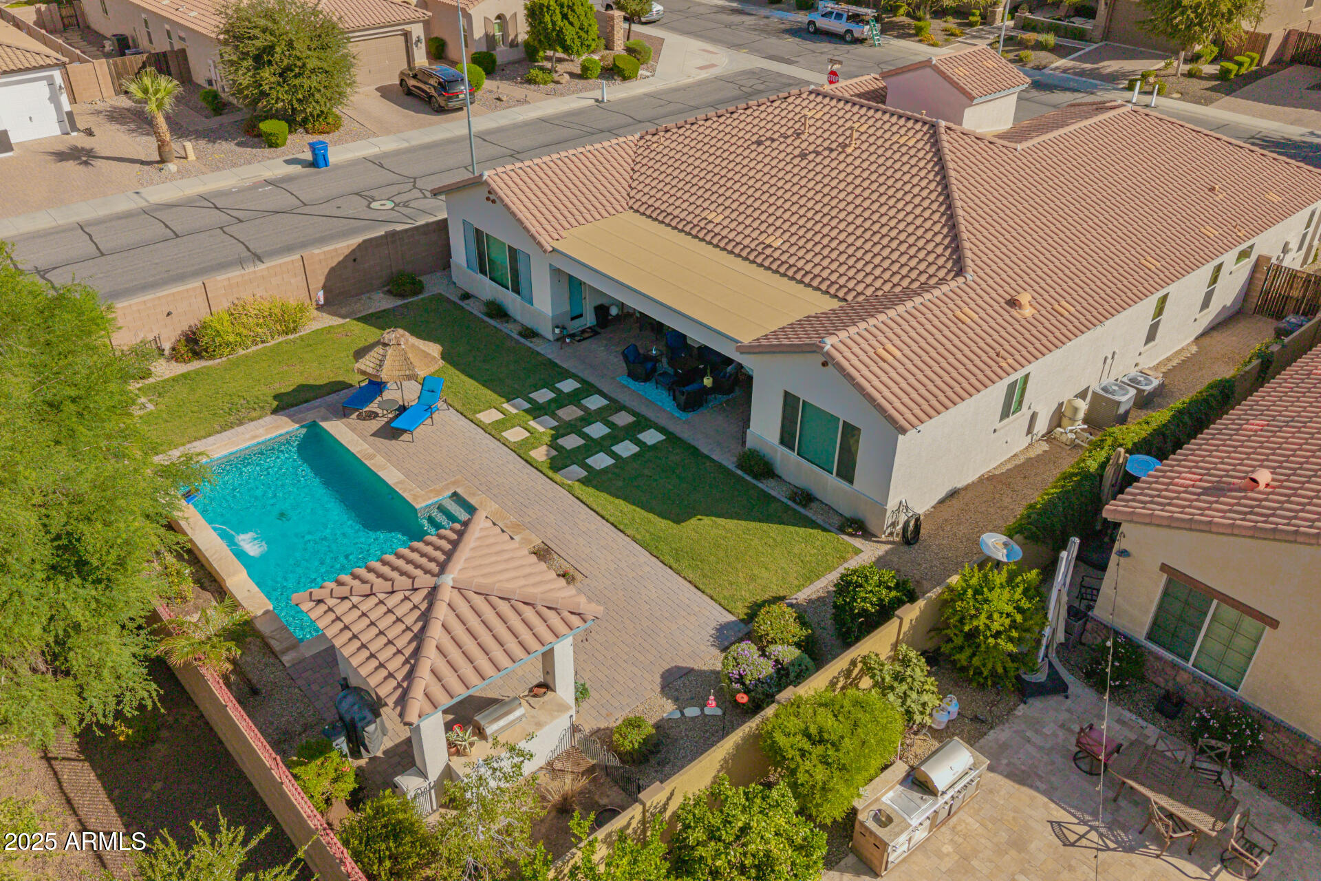 1672 South Sunset Drive Chandler, AZ 85286 - Photo 5 of 68 an aerial view of a house with a yard
