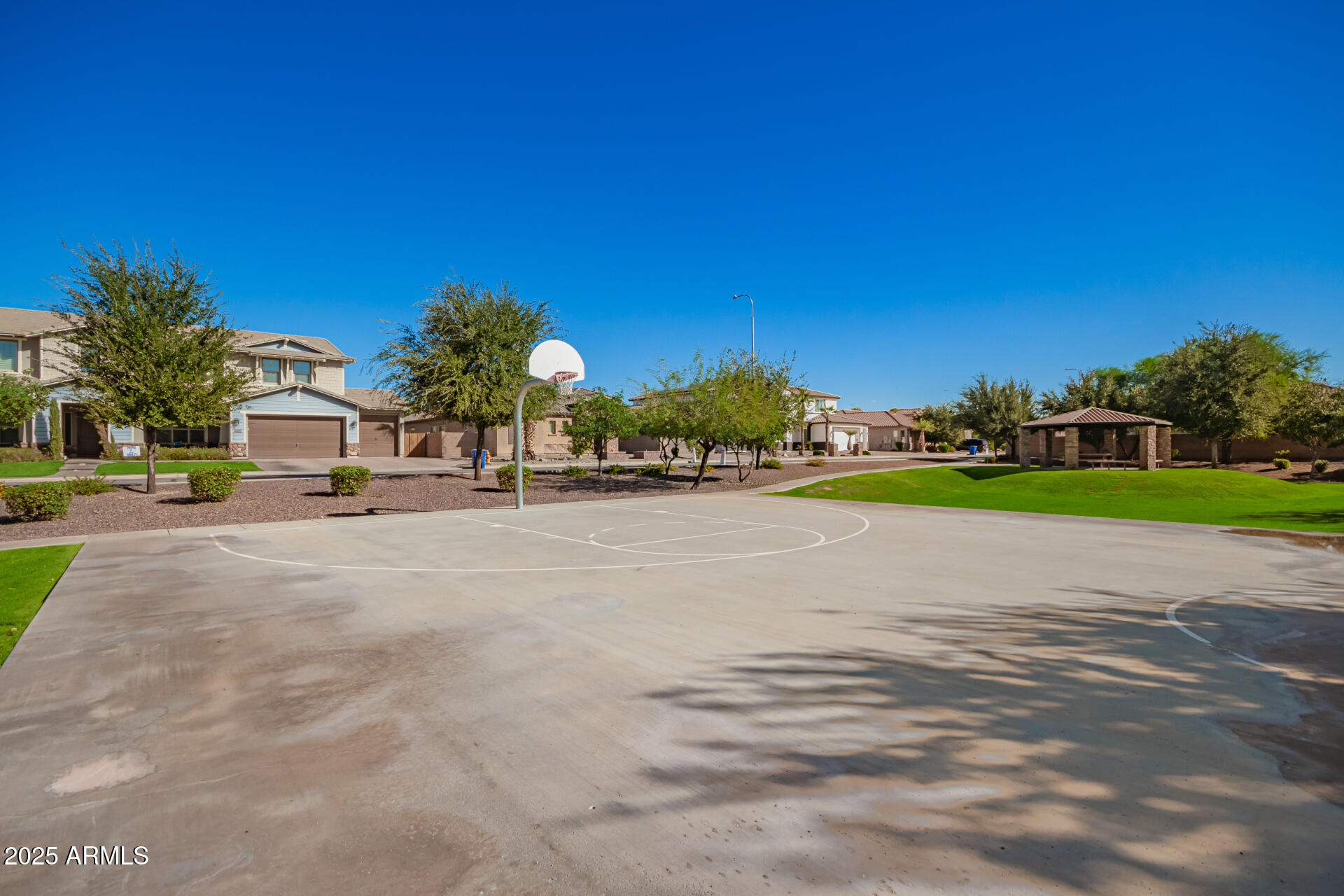 1672 South Sunset Drive Chandler, AZ 85286 - Photo 53 of 68 a view of a house with a street