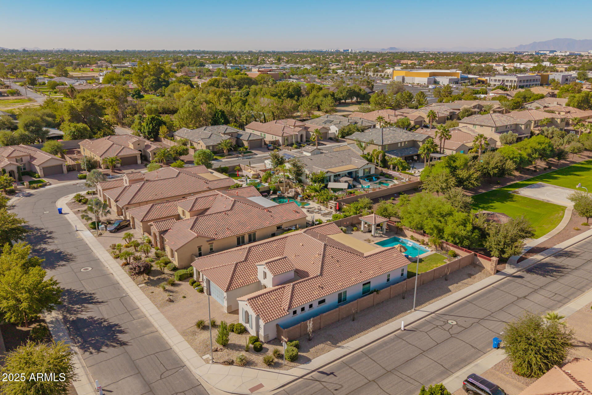 1672 South Sunset Drive Chandler, AZ 85286 - Photo 61 of 68 an aerial view of a house with a swimming pool