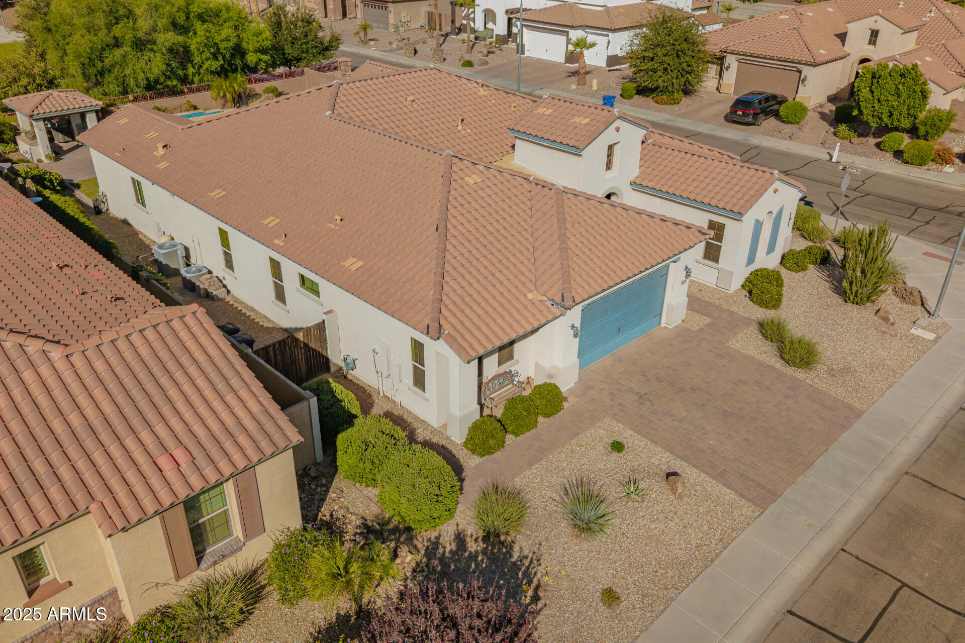 1672 South Sunset Drive Chandler, AZ 85286 - Photo 63 of 68 an aerial view of a house with large trees