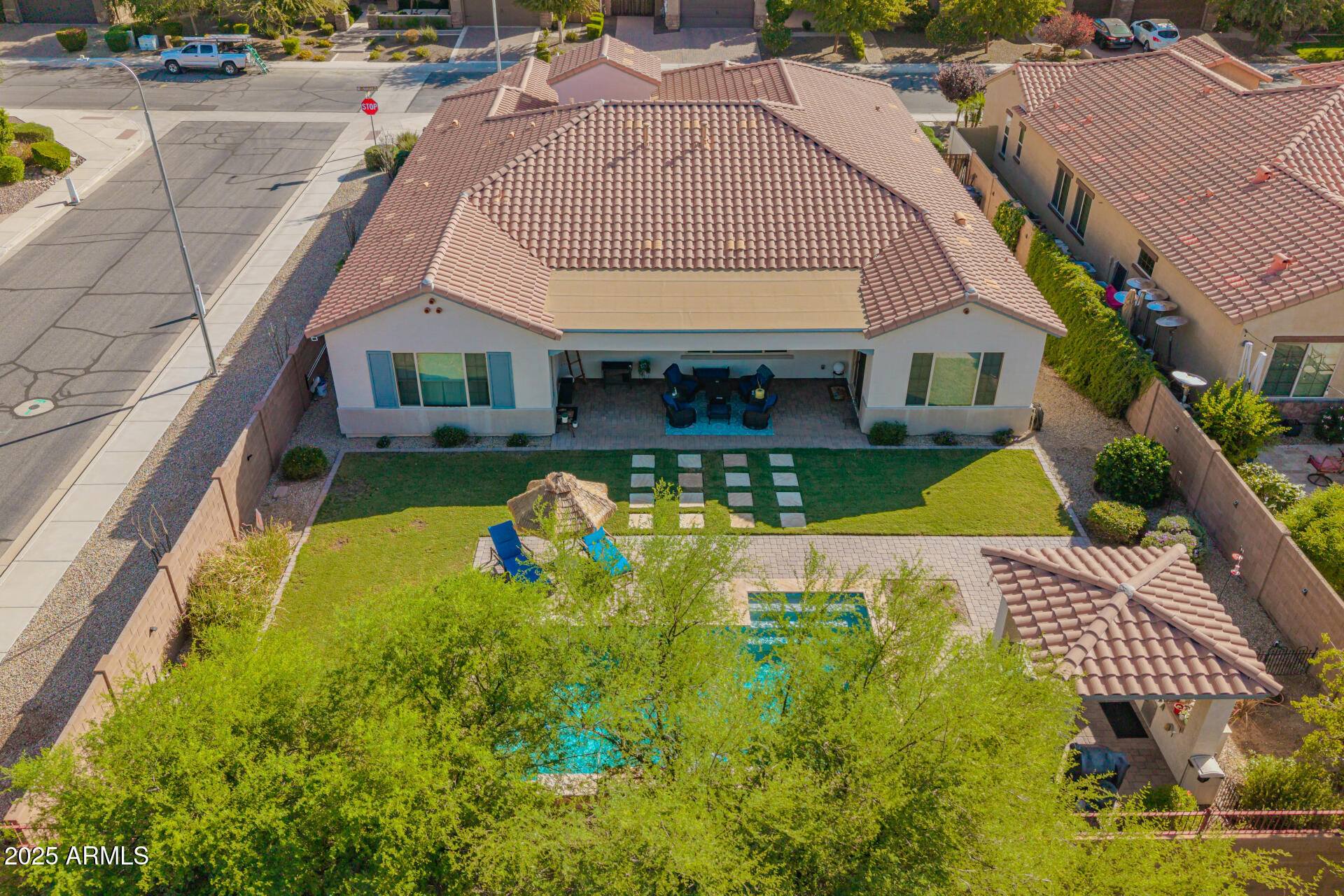 1672 South Sunset Drive Chandler, AZ 85286 - Photo 65 of 68 a view of an house with swimming pool patio and outdoor seating