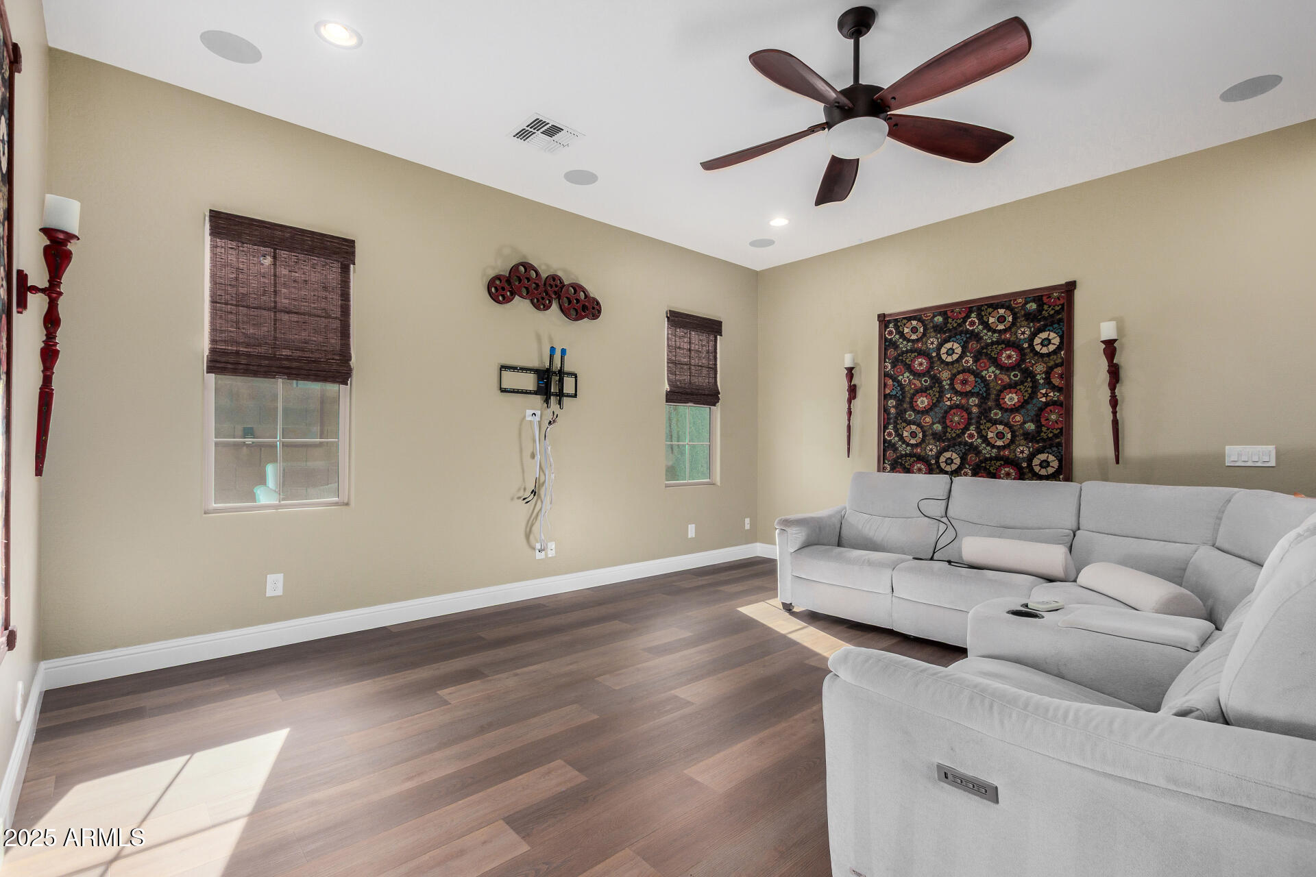1672 South Sunset Drive Chandler, AZ 85286 - Photo 8 of 68 a living room with furniture and a ceiling fan