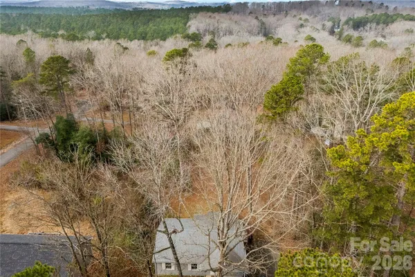 a view of lake with green space