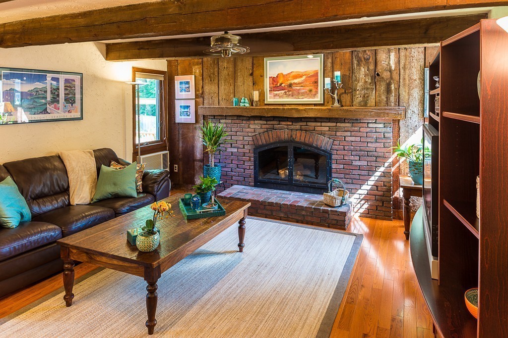 3 Jane Road Marblehead, MA 01945 - Photo 5 of 25 a living room with furniture and a fireplace