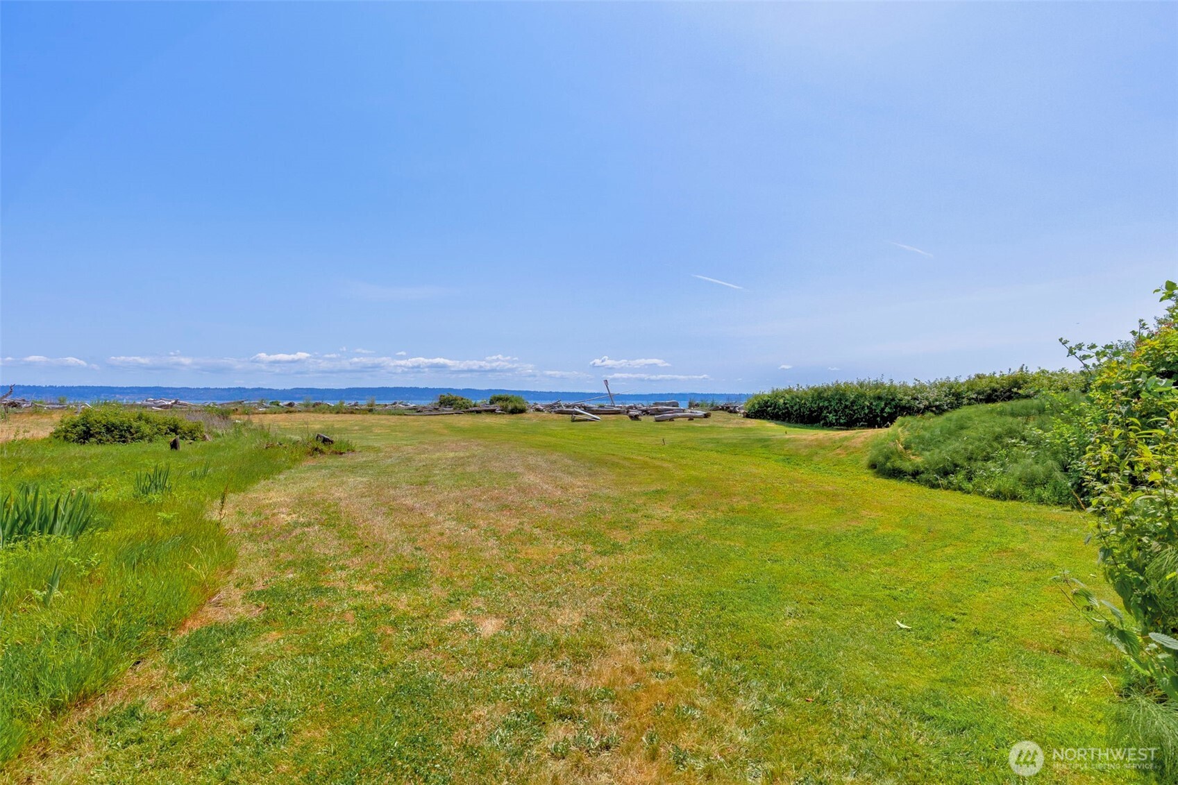 20818 President Point Road Northeast Kingston, WA 98346 - Photo 9 of 36 a view of an outdoor space and a yard
