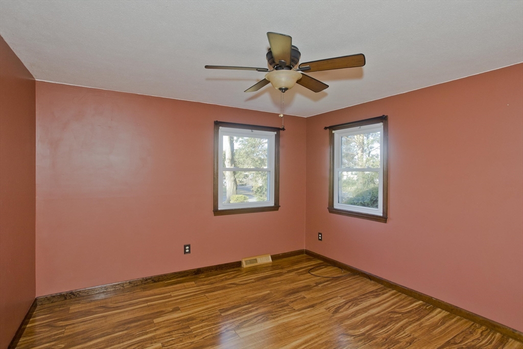 134 Mallard Circle Agawam, MA 01001 - Photo 20 of 36 a view of empty room with wooden floor and fan