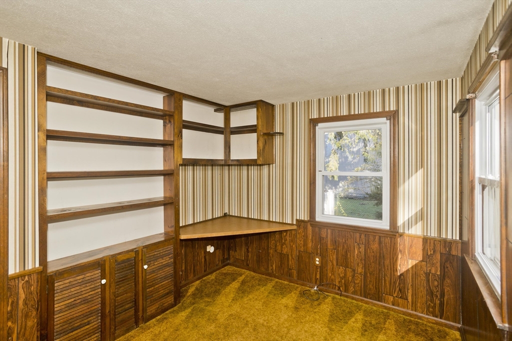 134 Mallard Circle Agawam, MA 01001 - Photo 24 of 36 a view of an empty room with a window and a livingroom