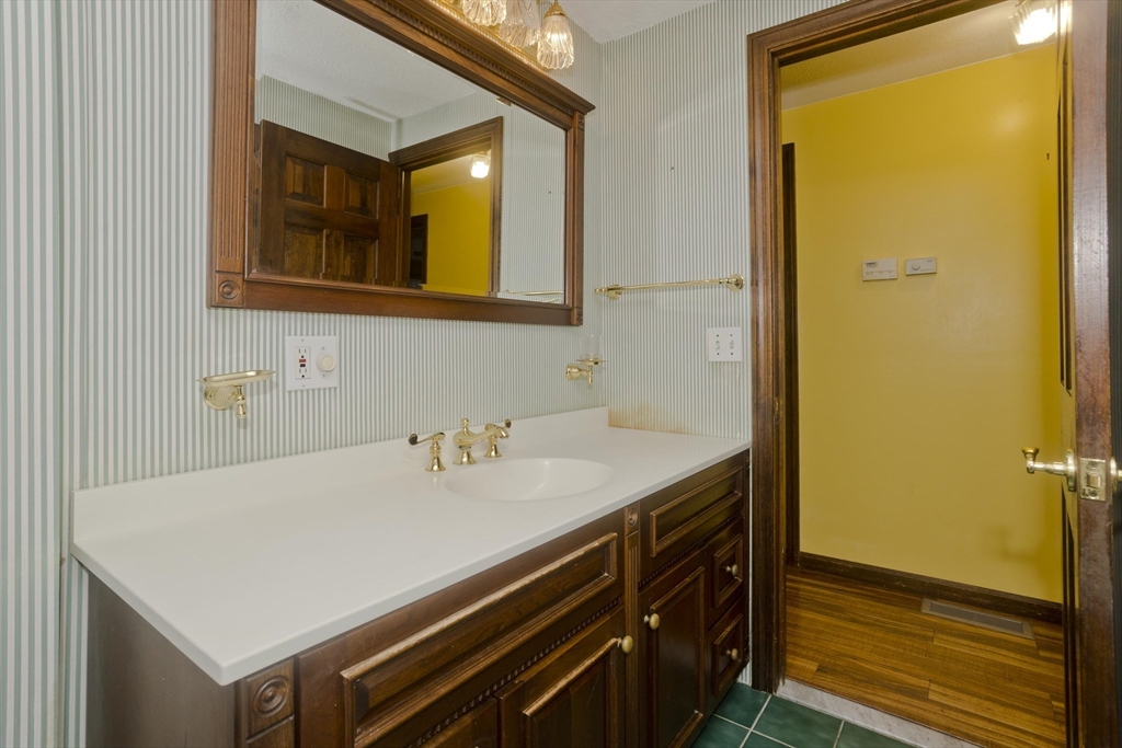 134 Mallard Circle Agawam, MA 01001 - Photo 28 of 36 a bathroom with a sink and a mirror