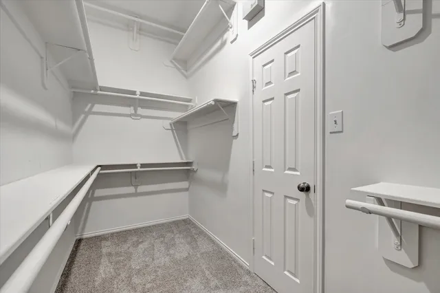 a view of an empty walk in closet