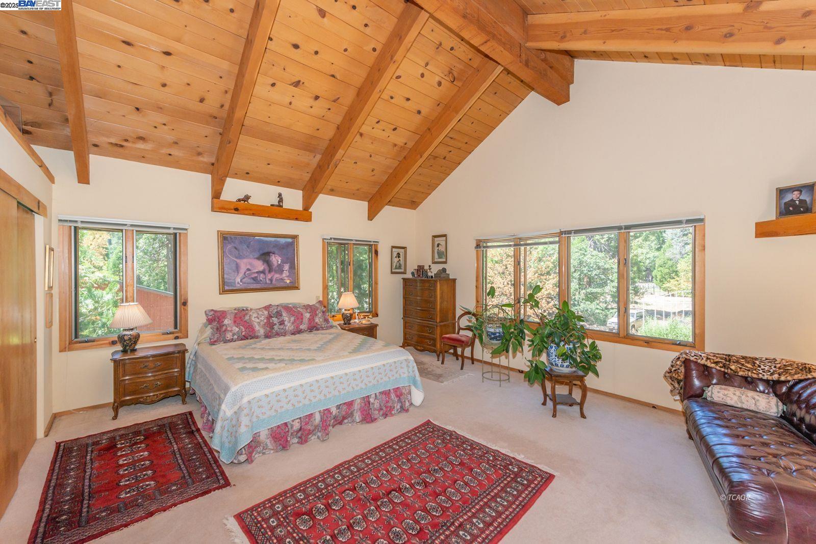 30 Dorleska Court Trinity Center, CA 96091 - Photo 18 of 50 a bedroom with a large bed and a couch