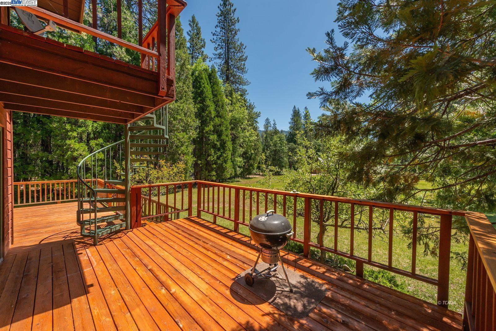 30 Dorleska Court Trinity Center, CA 96091 - Photo 32 of 50 a view of balcony with wooden floor and outdoor seating