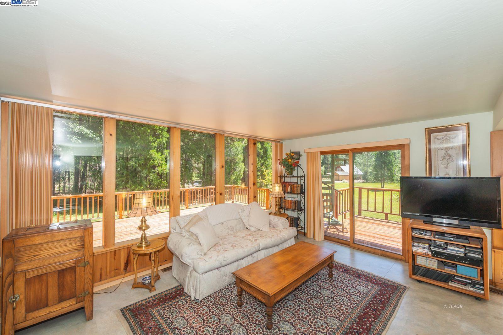 30 Dorleska Court Trinity Center, CA 96091 - Photo 4 of 50 a living room with furniture and a flat screen tv