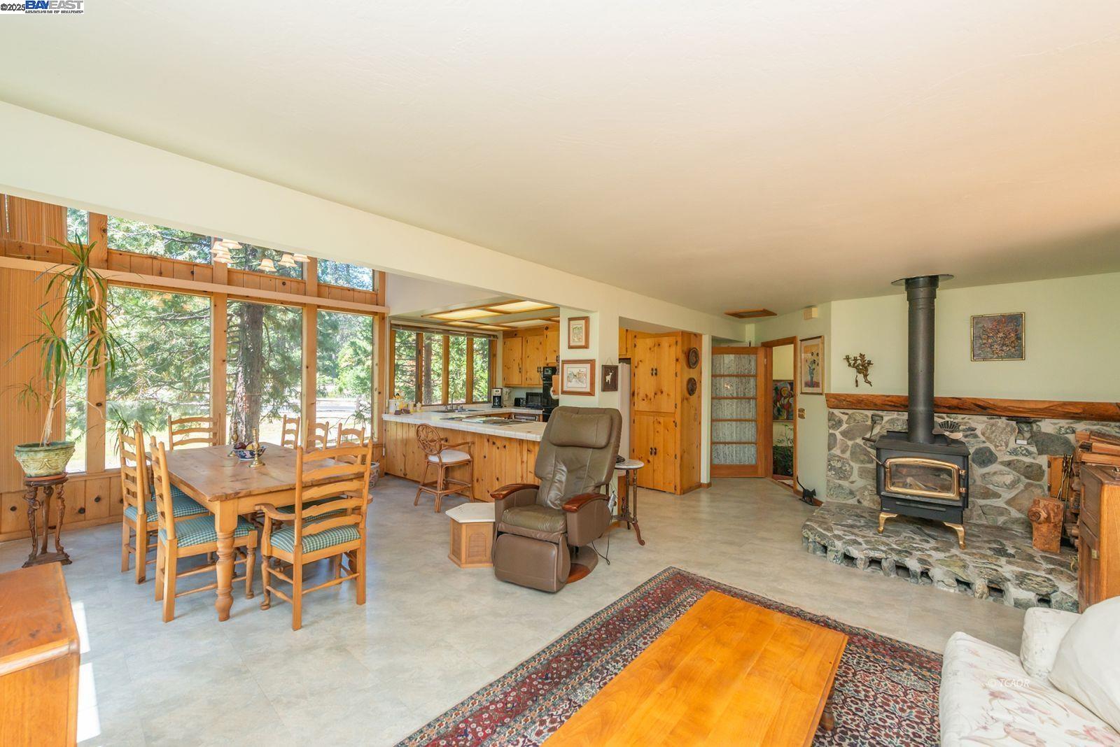 30 Dorleska Court Trinity Center, CA 96091 - Photo 9 of 50 a living room with furniture a rug and white walls
